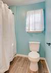 Full bathroom. Newer tile. Linen closet. Shower/tub combo. Freshly painted trim throughout the house. 
