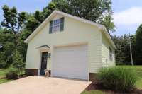 1-car detached garage building with loft area