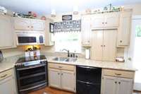 Kitchen has lots of cabinets