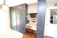 Kitchen with desk and lots of storage