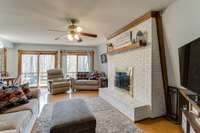 The natural light in this home is wonderful! You have doors across the backside of the living room and kitchen leading out to the amazing deck!