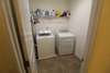 Spacious utility room with plenty of opportunity to utilize shelving or cabinets in the future. 