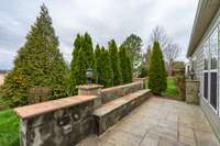 This functional and stylish grilling area also provides seating so that everyone can chat with the chef.