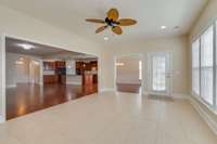 A great look at the openness provided with this floor plan, and a door leading out onto your screened porch.