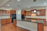 Can you believe all of this counter space and cabinets!  Lots of pull out shelving as well.  And yes...a convenient pantry with plenty of room for groceries.