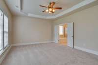 So much space in the master suite that there is plenty of room to make a sitting area.