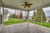 You will absolutely fall in love with this screened porch!  Everyone loves that outdoor living space, and this gives you the best of both worlds with a stamped concrete floor that is easy to maintain.