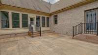 Back patio with access from the Florida Room, Master Suite and the "other" Master Suite.