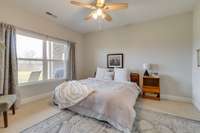 Luxuriously large primary room, professional measurements available.