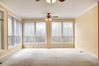 Family room is full of lots of light provided with all the windows