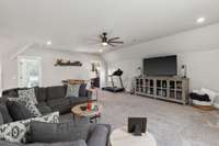 The bonus room upstairs is a perfect getaway to watch movies or just hang out. 