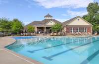 Resort style amenities include walking trails, pool, kid's pool, splash pad, playground, fitness center and huge clubhouse.