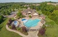 Resort style amenities include walking trails, pool, kid's pool, splash pad, playground, fitness center and huge clubhouse.