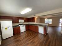 Brand new refrigerator & microwave.  Beautiful refinished cabinets really are nicer than the original.