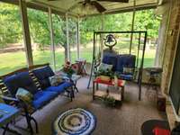 NICE COVERED & SCREENED BACK PORCH TO ENJOY SUMMER EVENINGS!