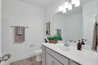 2nd Full Bath. The home featured in these photos is similar to the one under construction.  Selections may vary.