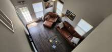 This is the view of the living room from the upstairs loft.