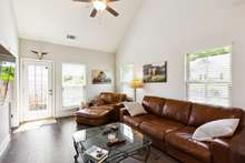 Vaulted ceilings in the living room area create such a spacious feel.