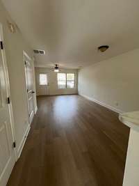 Open family room, dining area to kitchen.