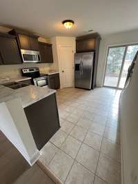 Kitchen with new cabinets and counter tops.