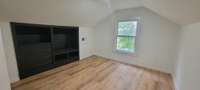 3rd bedroom upstairs with built in bookshelves