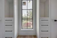 Lots of detailed built-ins plus natural light in the primary closets.  Impressive!