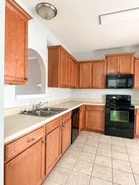 Spacious kitchen with lots of storage.