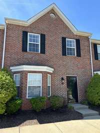 Welcome home!  This brick townhome is sure to check all the boxes!