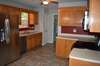 Eat-in kitchen includes ceramic tile flooring, Stainless appliances, refrigerator and pantry.