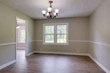 Oversized separate dining room with chandelier and large window for plenty of natural light. This room could also be a great flex space as an office, study, craft room, play room etc.