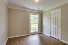 Nice sized bedroom #3 has crown molding