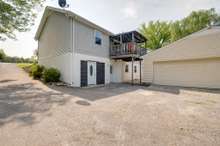 Back view of the home with two separate entrances.