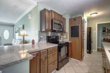 Pantry cabinet for extra storage and bar stool seating available.