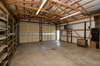 Looking from the back wall at the work bench to the 10 foot garage doors.