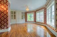 Bedroom 4 has beautiful large bay windows, built-ins and an ensuite bath.