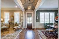 You'll find plantation shutters on about 95% of the windows; the Roman shades convey. The house is graced with innumerable windows allowing for lots of natural light. There's even a sealed and conditioned crawlspace.