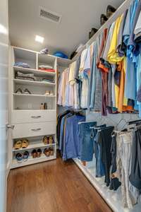 An additional walk-in closet off the primary suite gives extra storage.