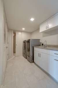 The 6x11 laundry and utility room provides plenty of space and extra storage capacity for easy home maintenance.