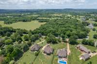 Drone view looking towards rear of residence, 523 Carver Lane in the middle