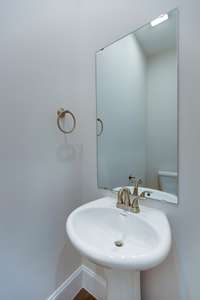 Powder Bathroom  ***Photo is of a previously built Cocoa. Selections and Standard Features may vary.***