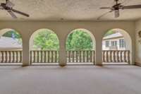 The upstairs porch overlooks the pool space. A great spot to meditate, do yoga, sit and relax.