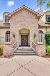 The custom stone facade at the entry was completed by the current owners.