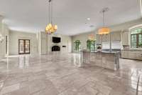 Another view of the kitchen and living area.