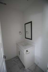 Half bath upstairs with quartz counter tops!