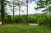 Expansive view from the front of the house across the valley to the neighboring mountain ridge