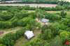 Aeriel view from behind barn and house