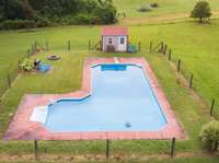 Beautiful inground swimming pool w/ pool house