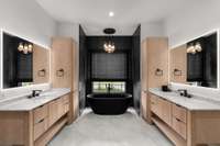 Primary bathroom with two separate vanities and private custom cabinet storage.