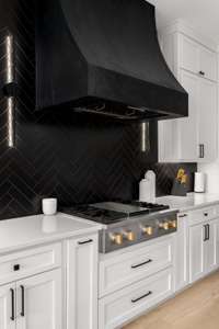 This gas stove with a griddle offers versatility for all culinary endeavors.