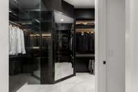 Beautifully under-lit lighting throughout the entire closet showcasing your wardrobe and special pieces.